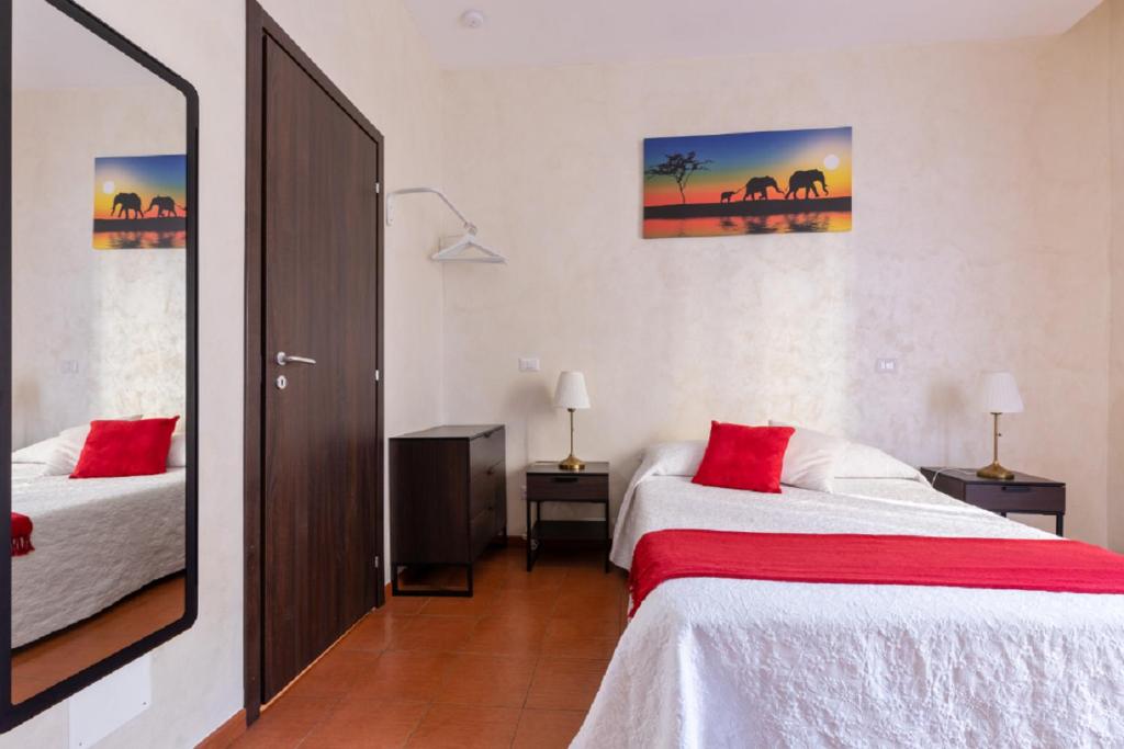 Posteľ alebo postele v izbe v ubytovaní Roma Enrico Guesthouse