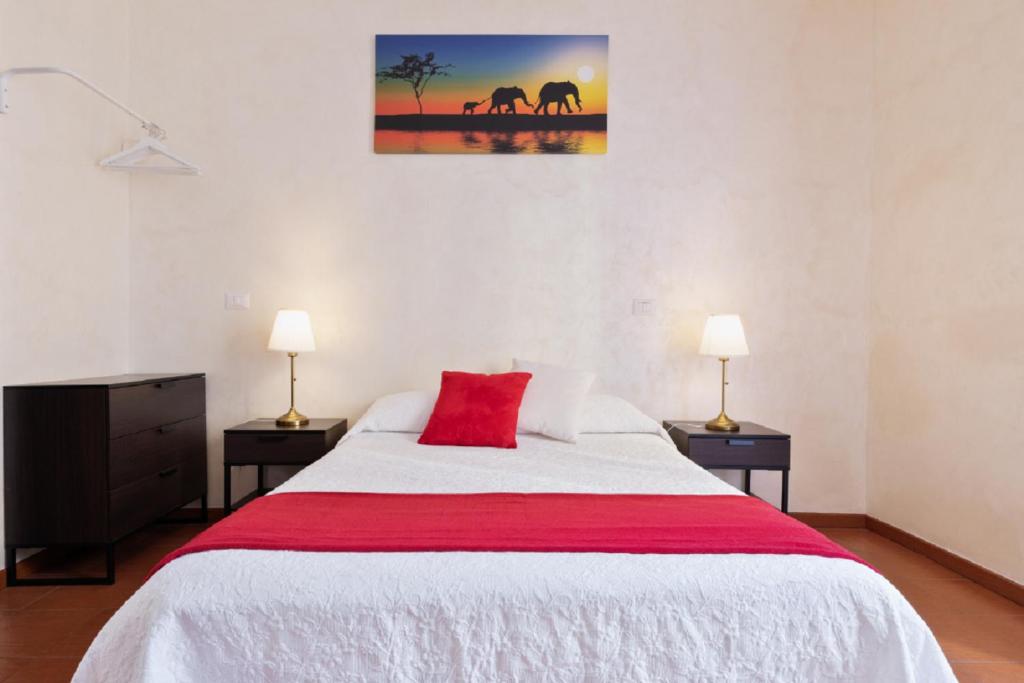 Posteľ alebo postele v izbe v ubytovaní Roma Enrico Guesthouse