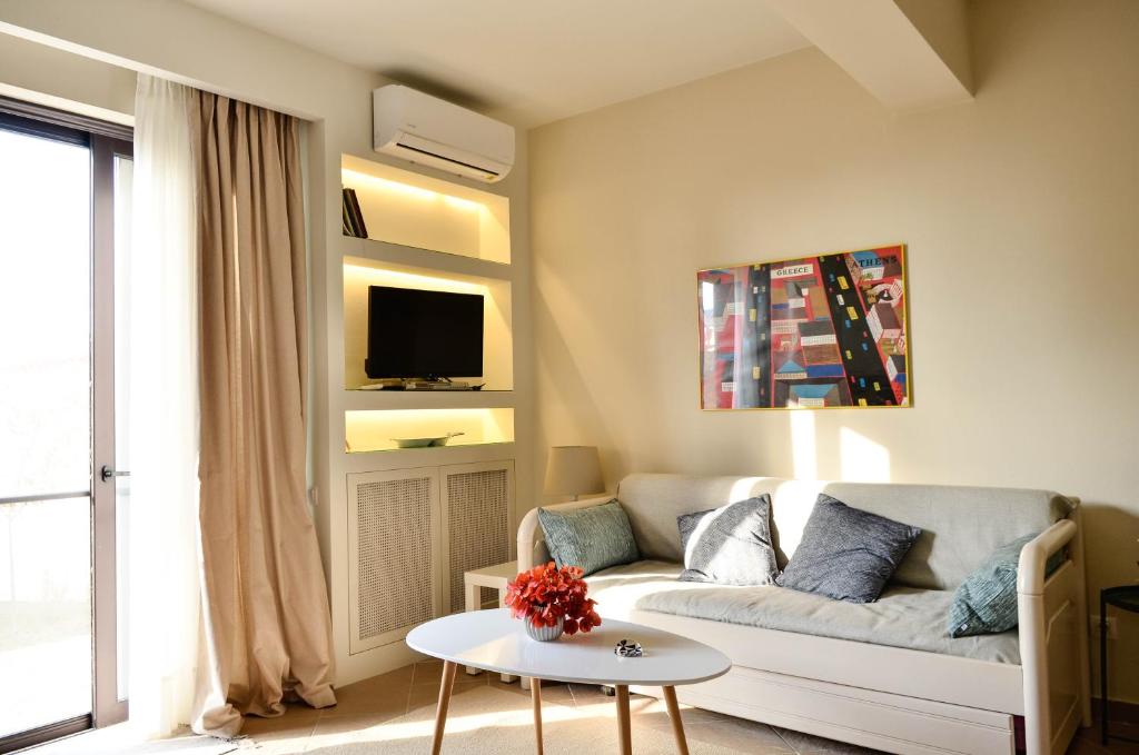 Televízia a/alebo spoločenská miestnosť v ubytovaní Sunrays housing