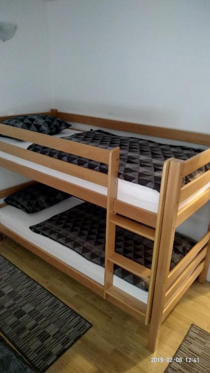 Postel nebo postele na pokoji v ubytování Apartman Hasen Vlašić