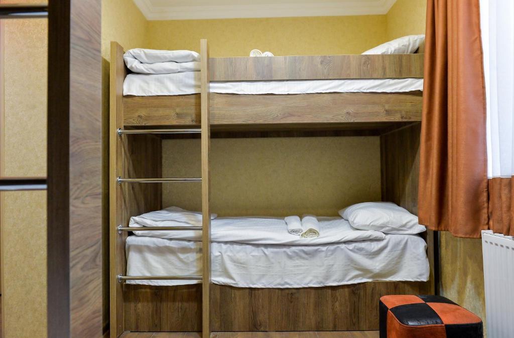 Postel nebo postele na pokoji v ubytování HOSTEL LOOK