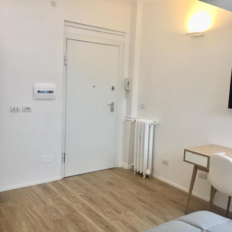 A bed or beds in a room at CORSO VENEZIA APARTMENT