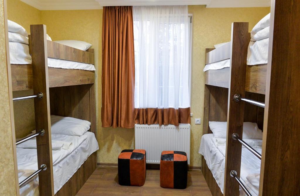 Postel nebo postele na pokoji v ubytování HOSTEL LOOK