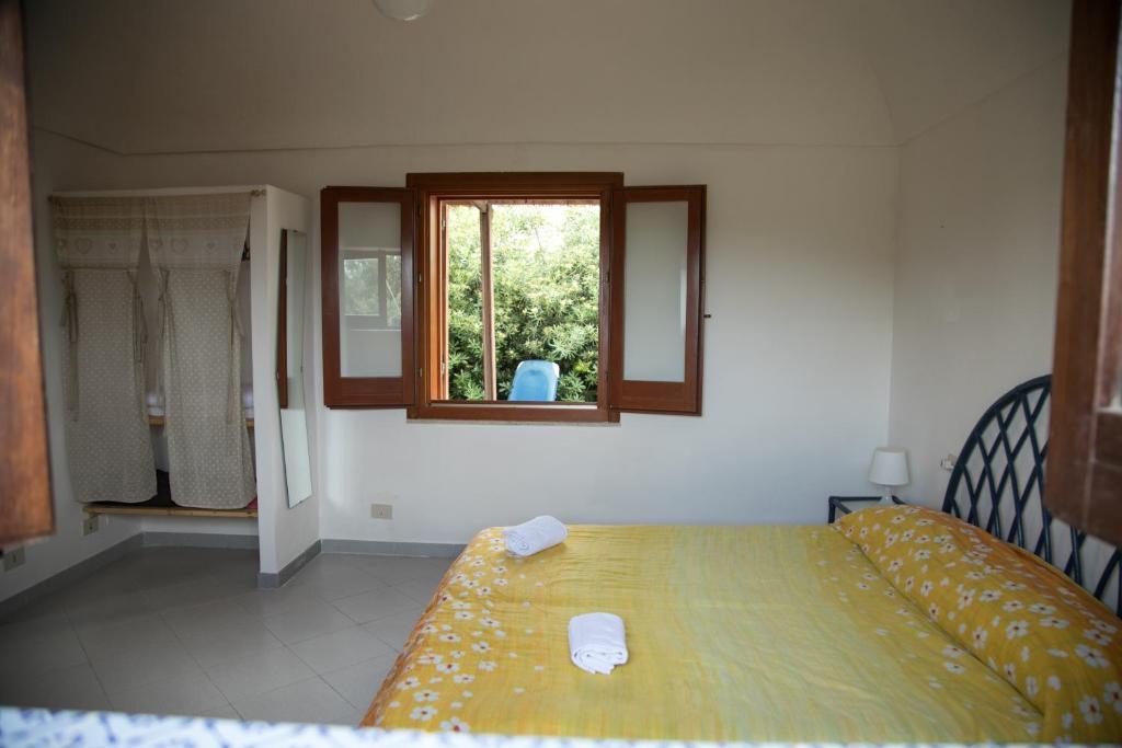 Letto o letti in una camera di Case Canino