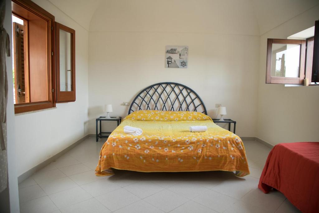 Letto o letti in una camera di Case Canino