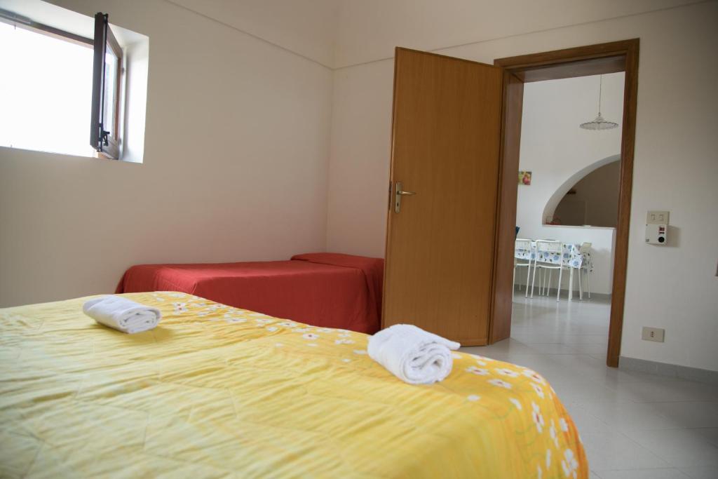Letto o letti in una camera di Case Canino