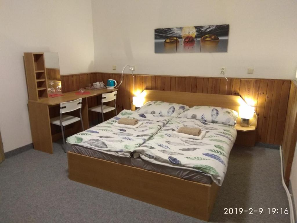 Postel nebo postele na pokoji v ubytování Prázdninový dům Na Panorámě
