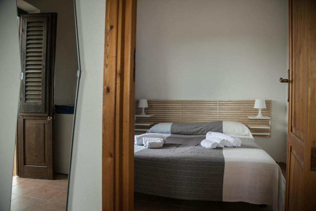 Letto o letti in una camera di Case Canino