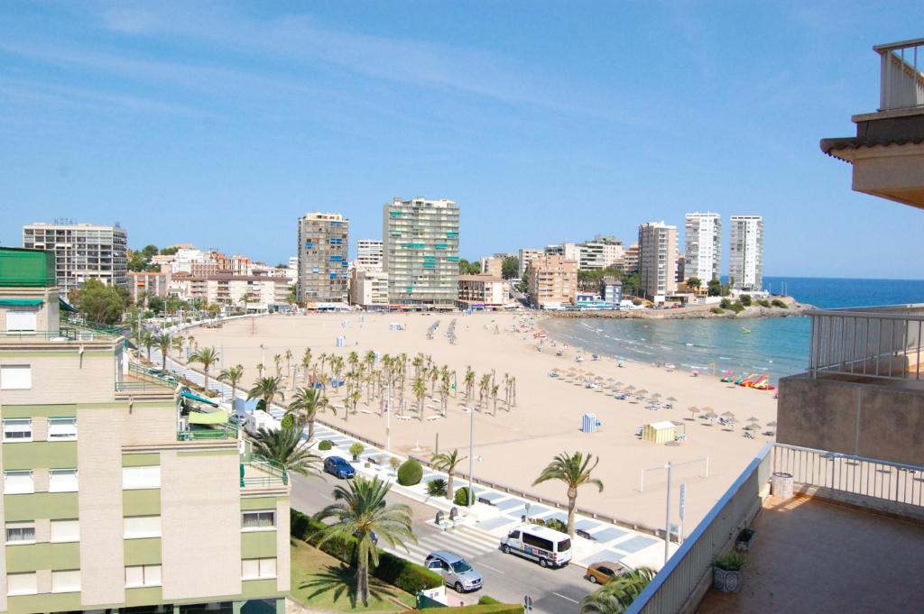 a view of a beach in a city with buildings at Villa Hortensia - Primera linea playa la concha in Oropesa del Mar
