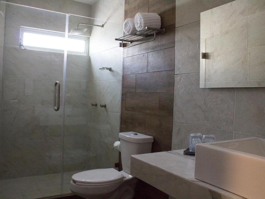 Koupelna v ubytování Hotel Corral Grande