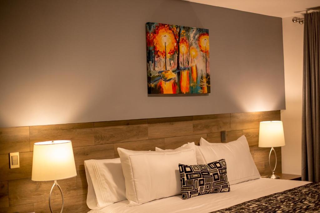 Postel nebo postele na pokoji v ubytování Hotel Corral Grande