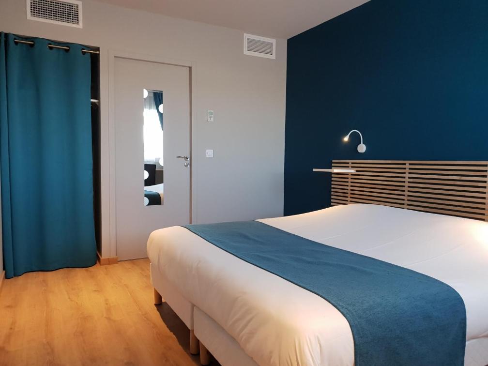 Postel nebo postele na pokoji v ubytování Hotel Restaurant L'Espassole