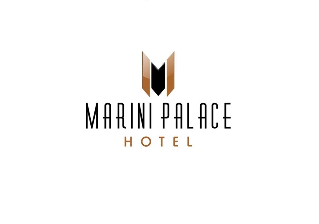 un nuevo logotipo del hotel marim palace en MARINI PALACE HOTEL en Colíder