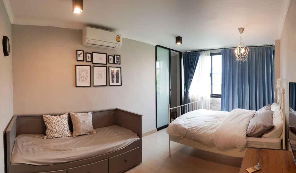 Wang Lang Hostel tesisinde bir odada yatak veya yataklar