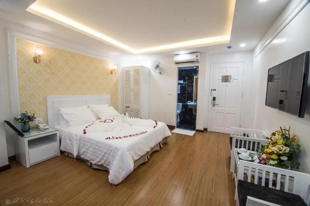Postel nebo postele na pokoji v ubytování Lieber Hotel