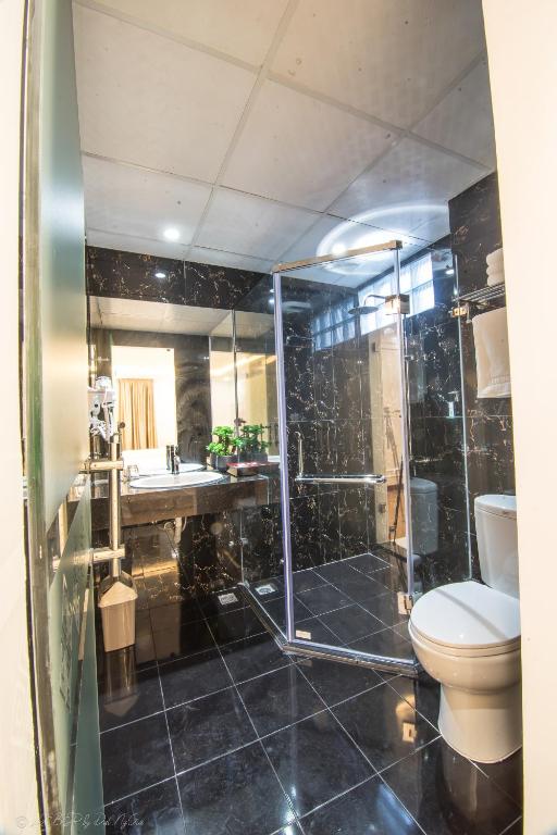 Koupelna v ubytování Lieber Hotel