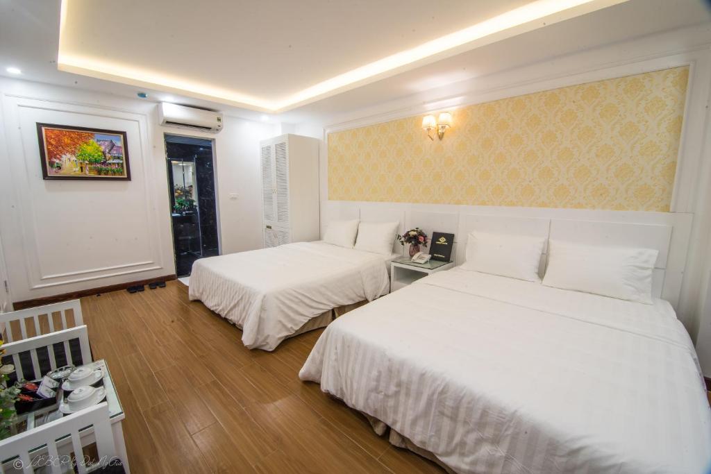 Postel nebo postele na pokoji v ubytování Lieber Hotel