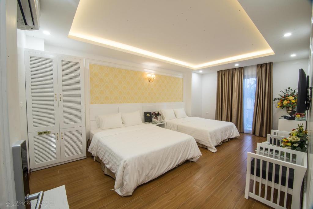 Postel nebo postele na pokoji v ubytování Lieber Hotel
