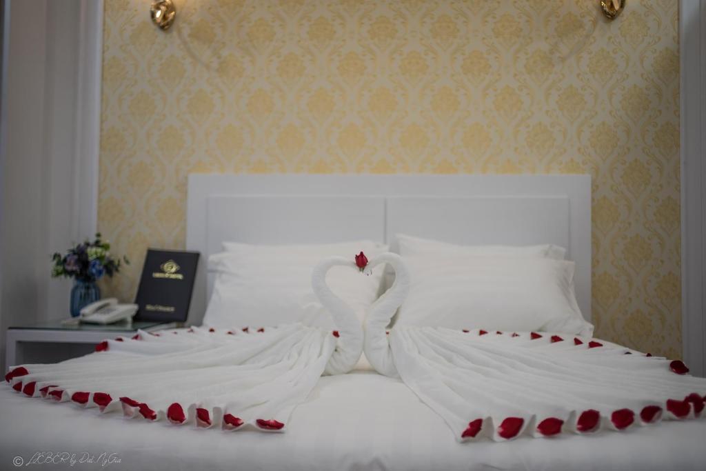 Postel nebo postele na pokoji v ubytování Lieber Hotel