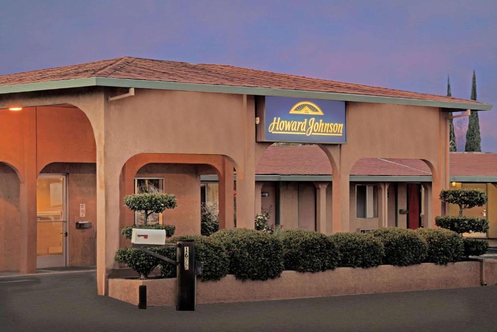 a front view of a banquet hall with a sign on it at Howard Johnson by Wyndham Modesto Ceres in Ceres