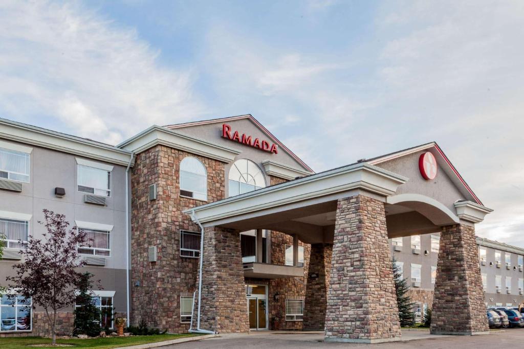 a rendering of the front of a hotel at Ramada by Wyndham Westlock in Westlock