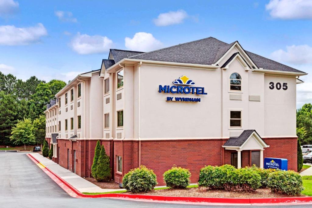 a rendering of the macy hotel of minneapolis at Microtel Inn & Suites by Wyndham Woodstock/Atlanta North in Woodstock