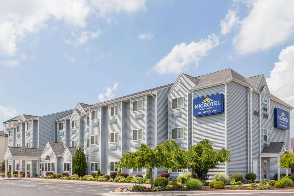 a rendering of the exterior of amg hotel at Microtel Inn and Suites Elkhart in Elkhart