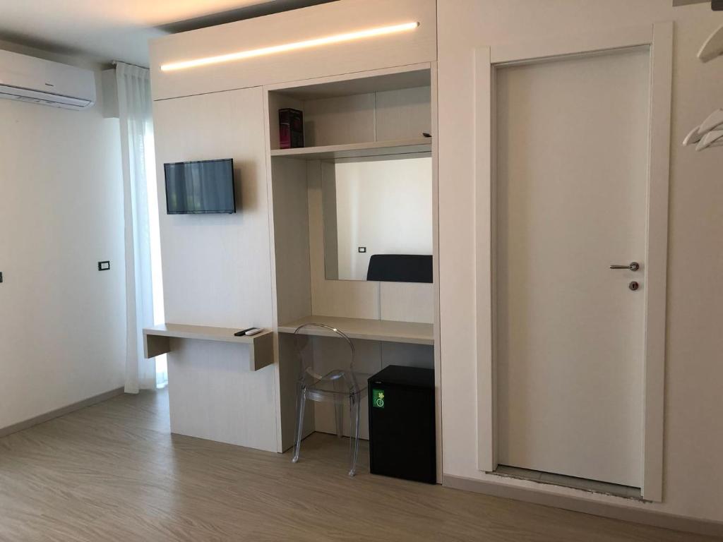 TV a/nebo společenská místnost v ubytování Hotel Portofino
