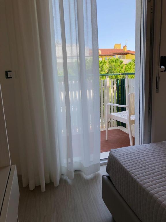 Postel nebo postele na pokoji v ubytování Hotel Portofino