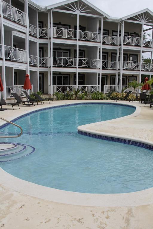 a large swimming pool in front of a hotel at Lantana Resort Barbados by Island Villas in Saint James
