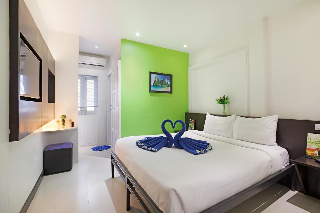 Postel nebo postele na pokoji v ubytování Colorize Boutique Hotel