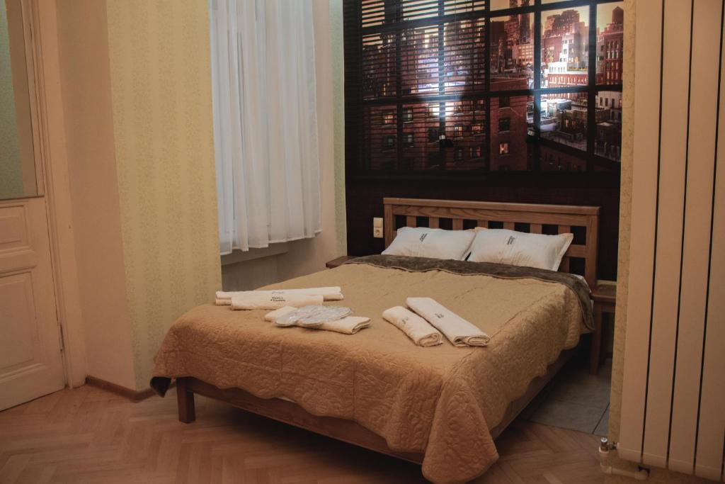 Postel nebo postele na pokoji v ubytování 4 RoomS
