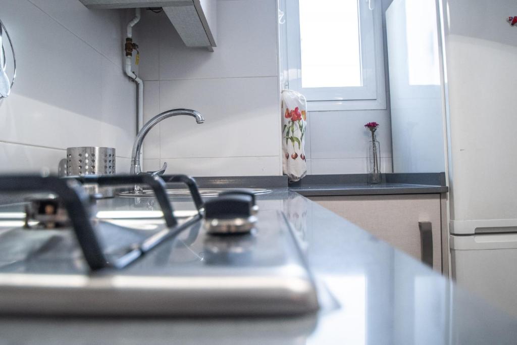 Kuchyň nebo kuchyňský kout v ubytování Apartamento La Bajamar