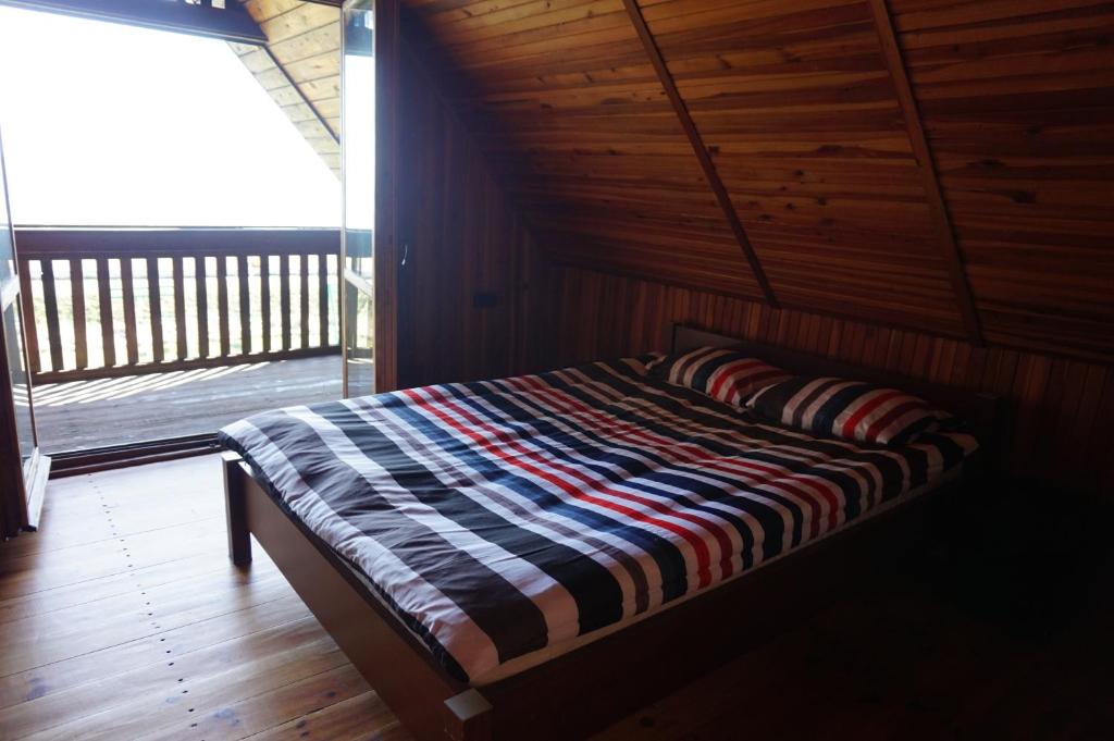 Postel nebo postele na pokoji v ubytování Sunrise Camp Łazy