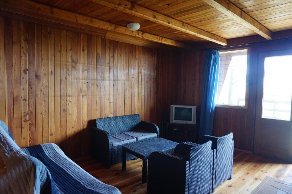 Posezení v ubytování Sunrise Camp Łazy