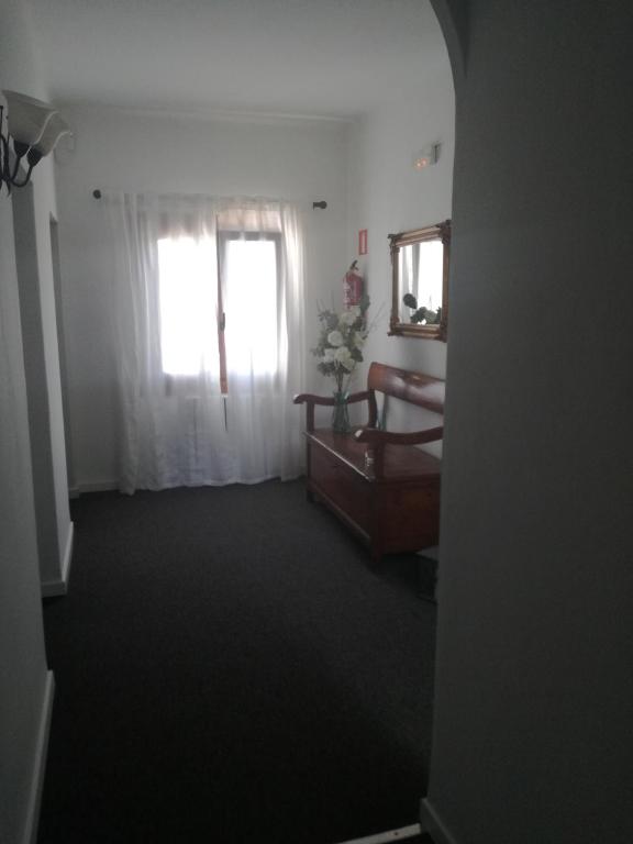 Postel nebo postele na pokoji v ubytování Boutique Hostal Mistral