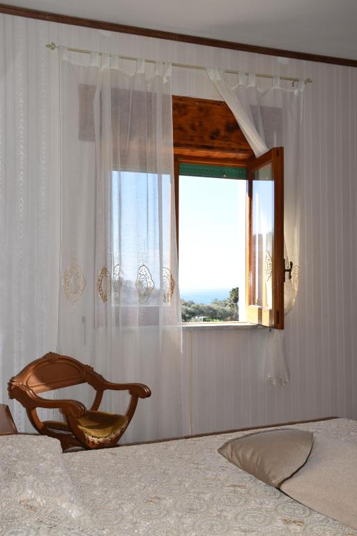 A bed or beds in a room at casa dei limoni