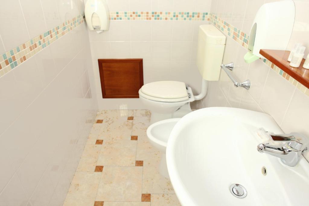 Koupelna v ubytování Albergo Maccotta