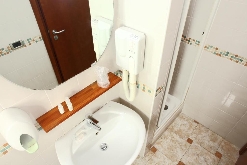 Koupelna v ubytování Albergo Maccotta