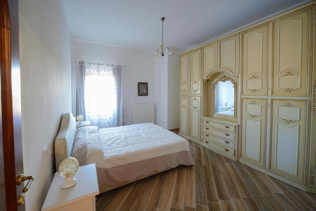 Postelja oz. postelje v sobi nastanitve La Vecchia cantina Guzzardi