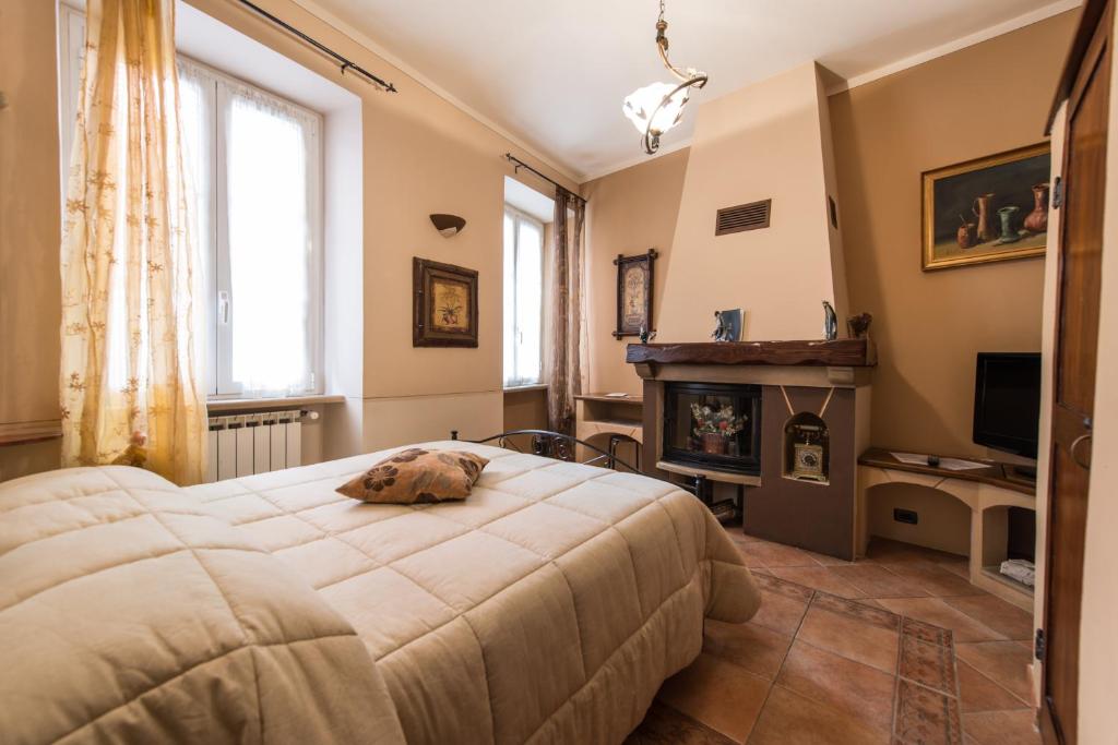 Postel nebo postele na pokoji v ubytování B&B Borgo Cortese