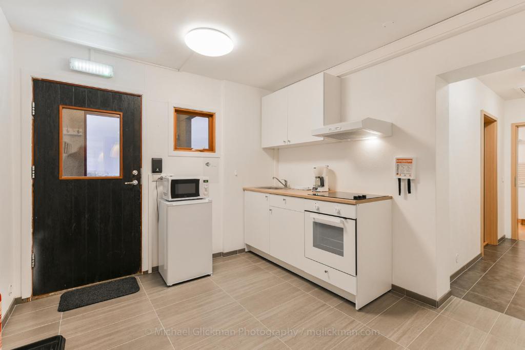 Kuchyň nebo kuchyňský kout v ubytování Garður guesthouse