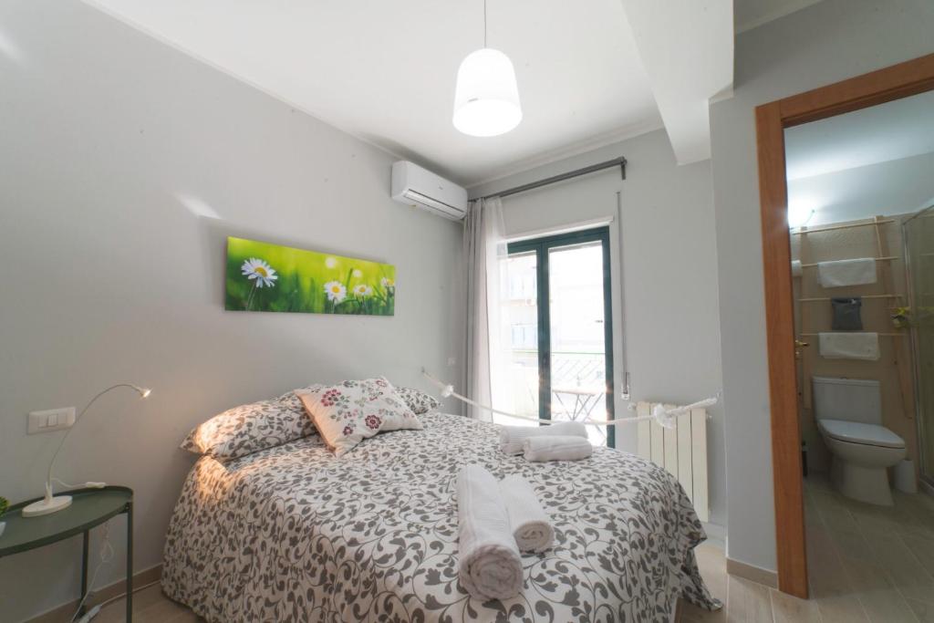 Posteľ alebo postele v izbe v ubytovaní B&B MaLò Family Friendly