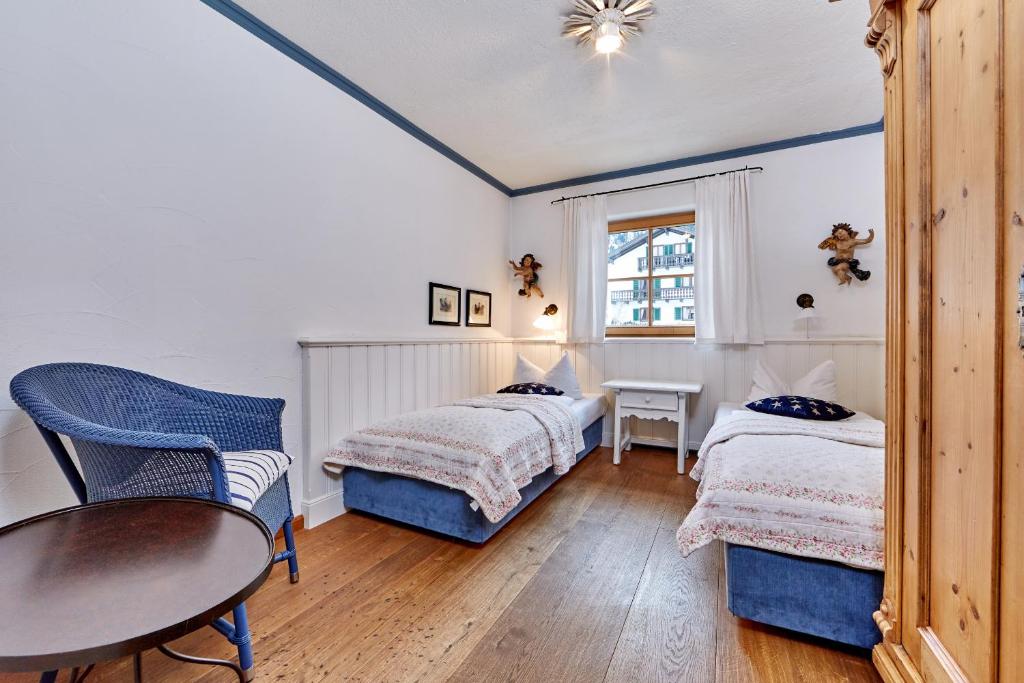 Postel nebo postele na pokoji v ubytování Hotel Föhrenhof