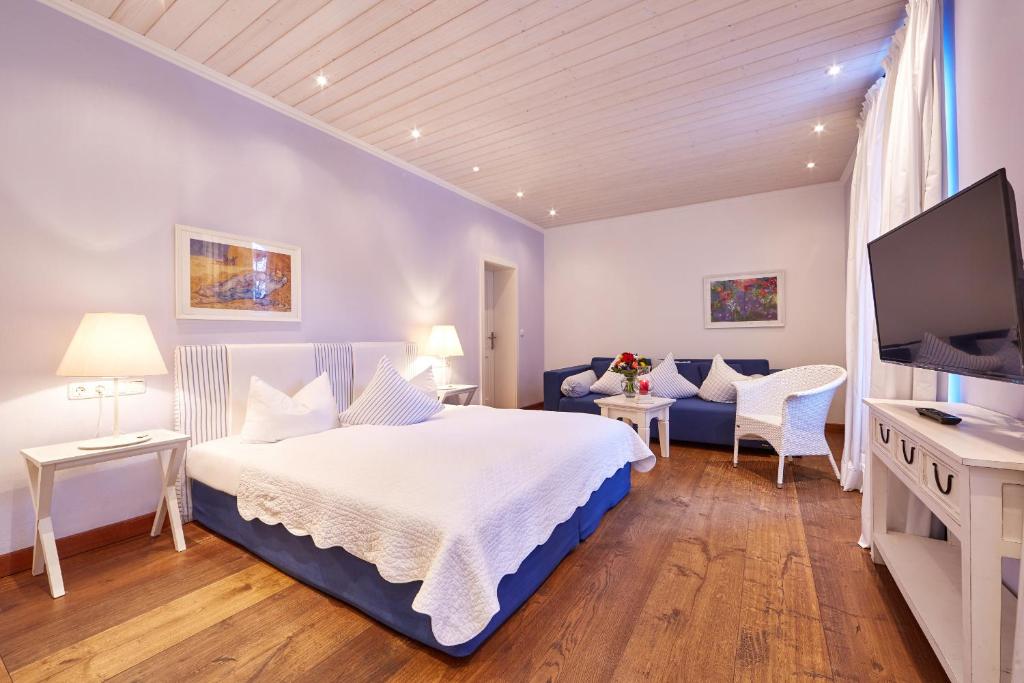 Postel nebo postele na pokoji v ubytování Hotel Föhrenhof