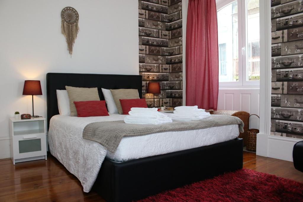 Ein Bett oder Betten in einem Zimmer der Unterkunft Almada Porto Downtown - by Guest SPA