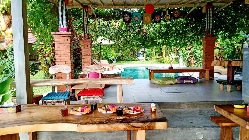 Bazén v ubytování Baliwid Villa Ubud nebo v jeho okolí