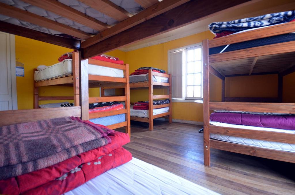Letto o letti in una camera di Hostal Kuyen