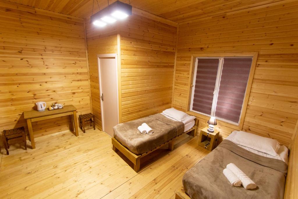 Postel nebo postele na pokoji v ubytování Cottage Shgedi