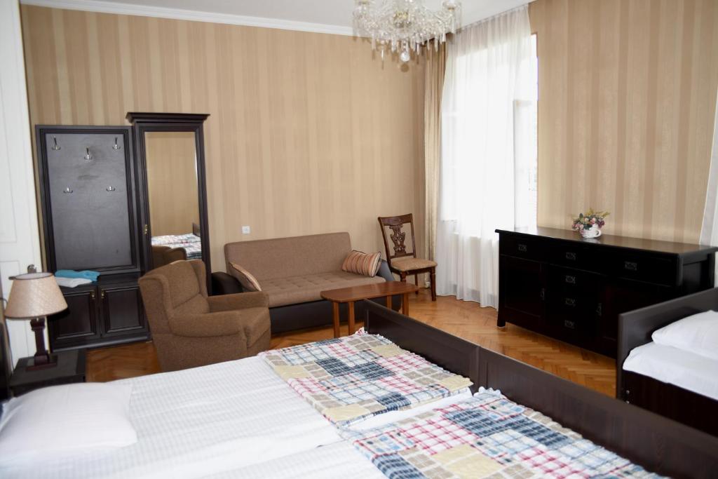 Postel nebo postele na pokoji v ubytování Tinikos Guest House